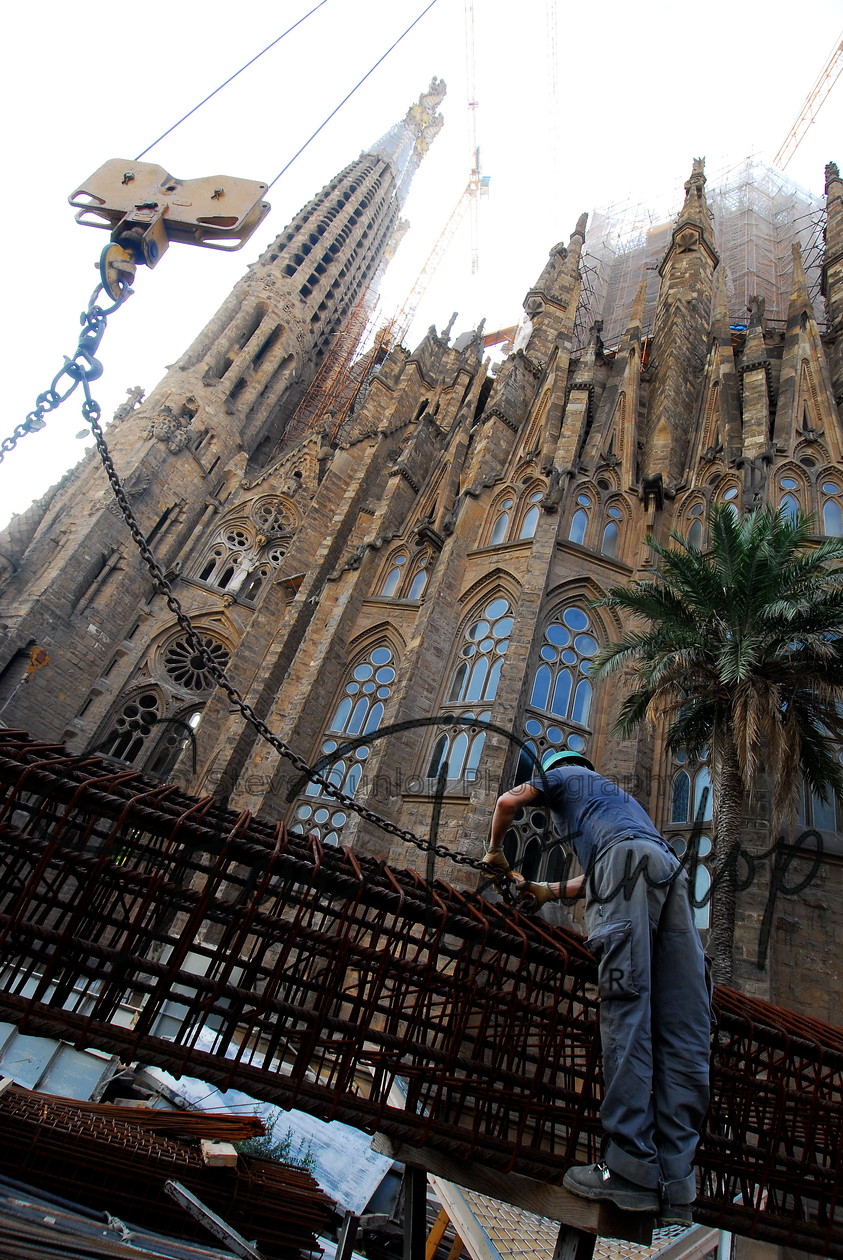 Barcelona Spain-6970 
 South Europe. Iberia. Spain. Catalan. Barcelona. A worker on The Sagrada Familia, Antoni Gaud's unfinished masterpiece in the city of Barcelona 
 Keywords: Spanish City Buildings Town urban Cafe society